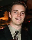 Smiling young man in suit and tie