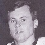 Black-and-white headshot of young man
