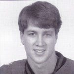 Smiling young man black-and-white headshot