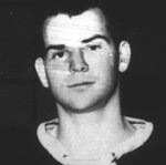 Black-and-white headshot of young man