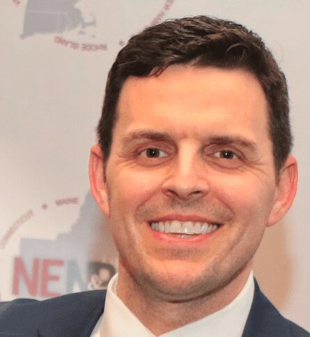 Smiling man wearing suit and tie