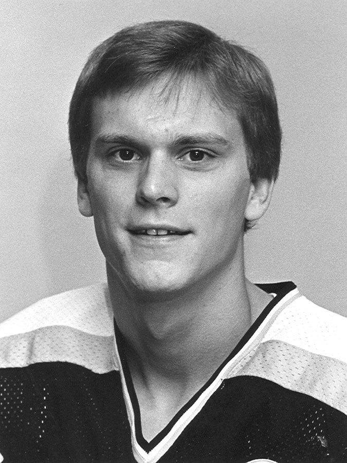 Black-and-white portrait of hockey player