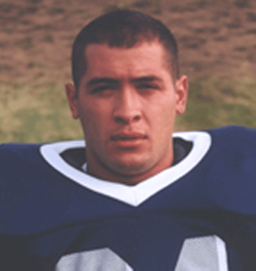 Portrait of football player in blue jersey