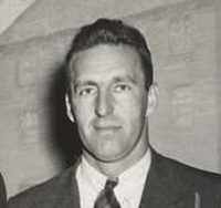 Black-and-white portrait of man in suit