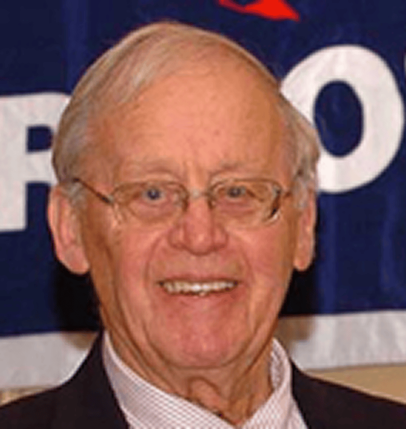 Smiling elderly man wearing glasses