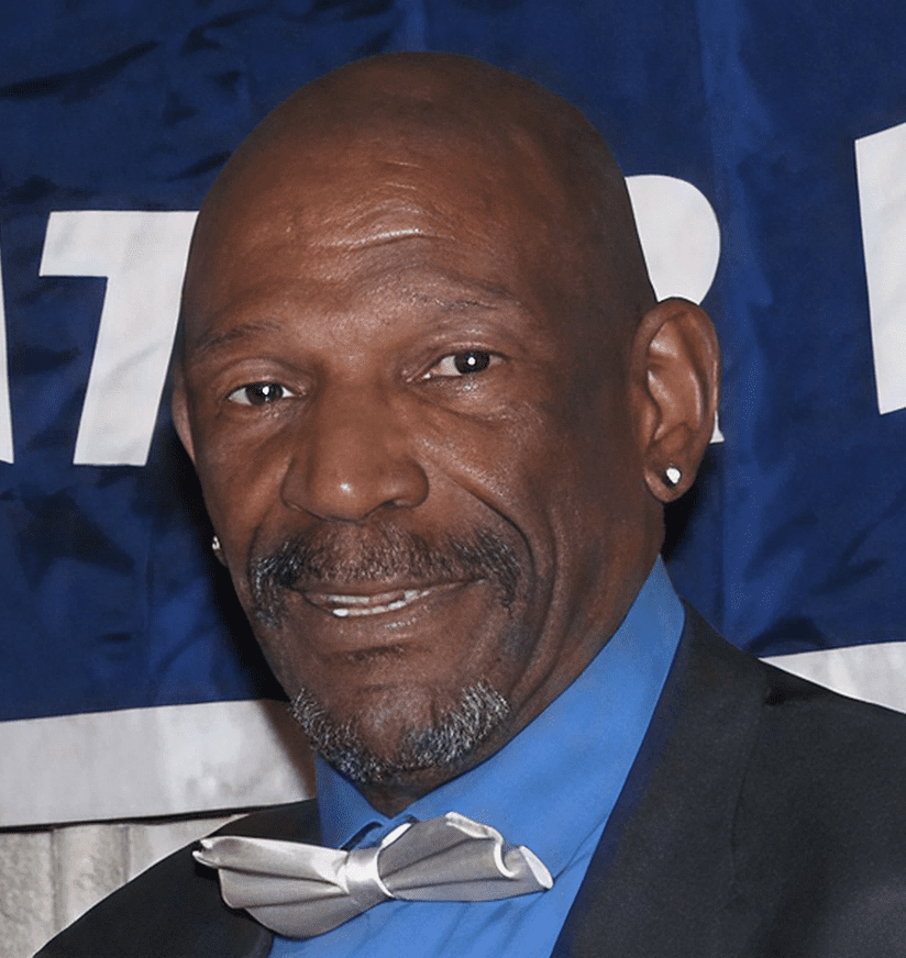 Smiling bald man wearing bow tie