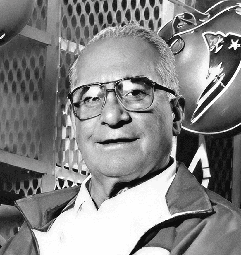 Smiling older man with glasses in jacket