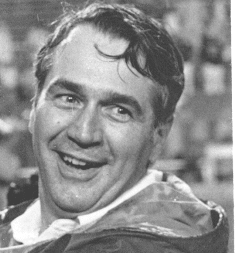Black-and-white portrait of smiling man