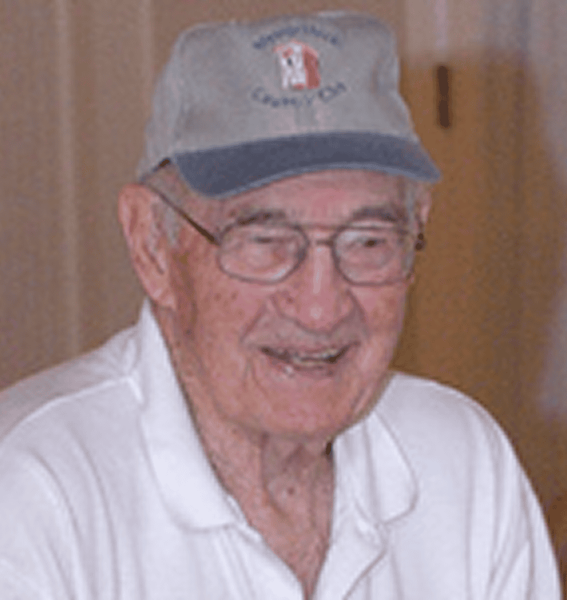 Smiling elderly man wearing cap and glasses