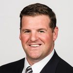 Smiling man in suit and tie portrait