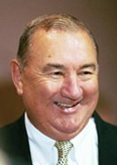 Smiling older man in suit and tie