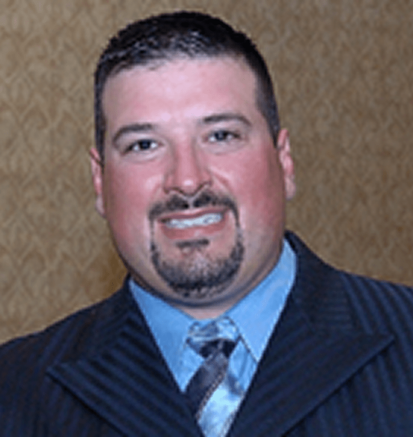 Smiling man in suit and tie