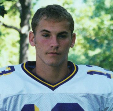Young athlete portrait wearing football jersey