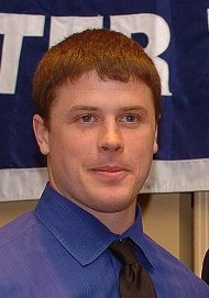 Young man in blue shirt and tie