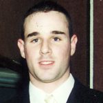 Close-up portrait of man in suit