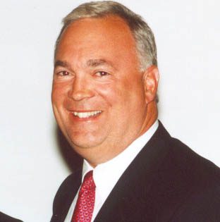 Smiling man in suit and tie