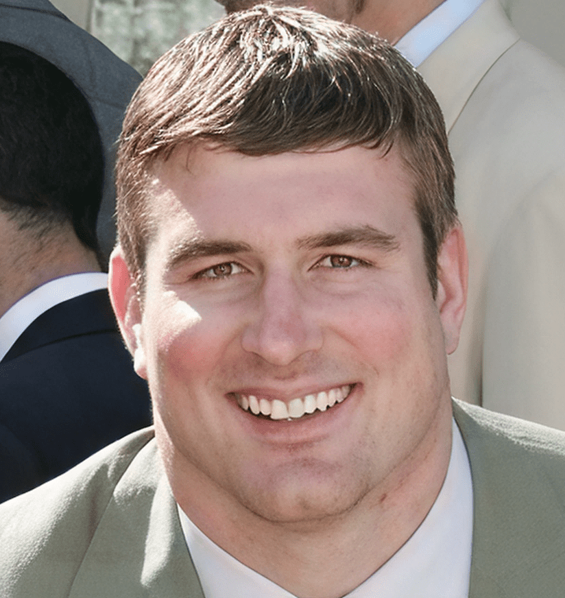 Close-up smiling man in suit jacket