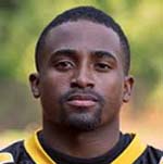 Person wearing black and yellow sports jersey