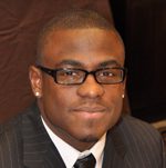 Young man in suit and glasses