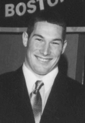 Smiling man in suit and tie