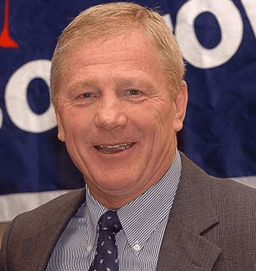 Smiling middle-aged man in suit and tie
