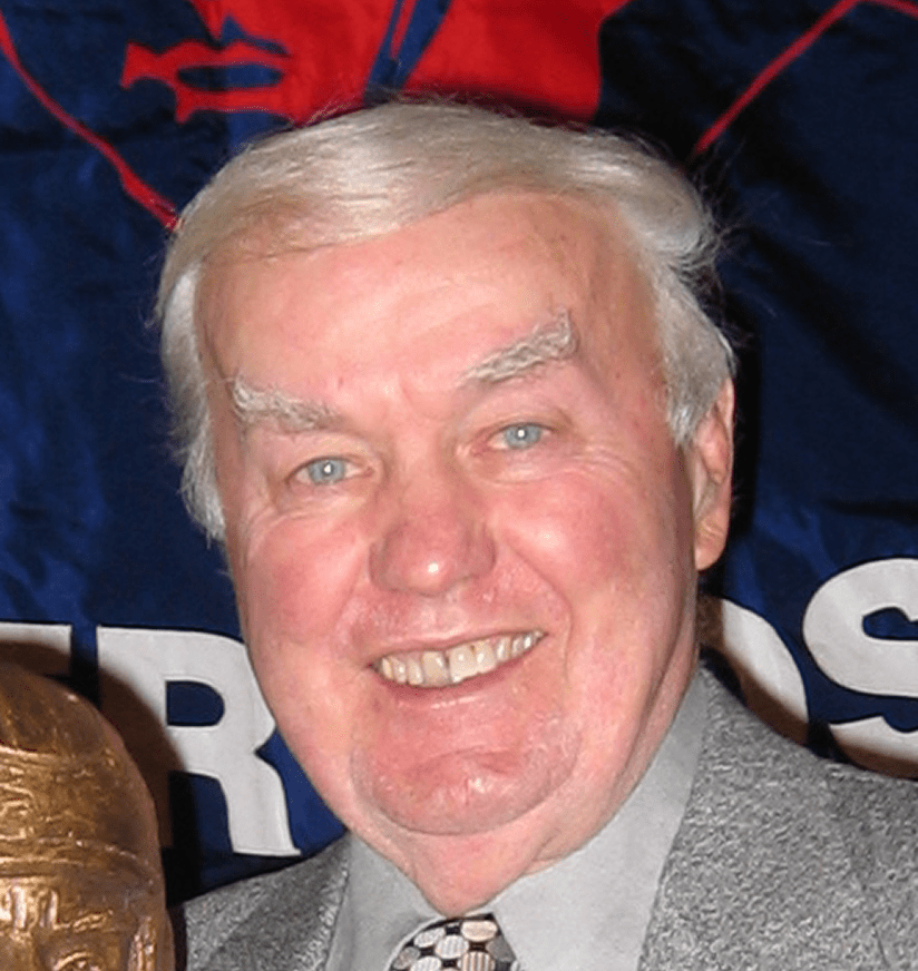 Smiling elderly man with white hair