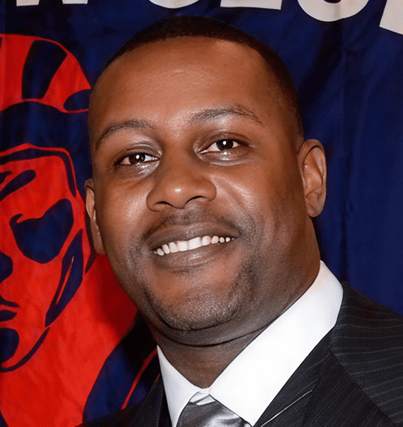 Smiling man wearing suit and tie